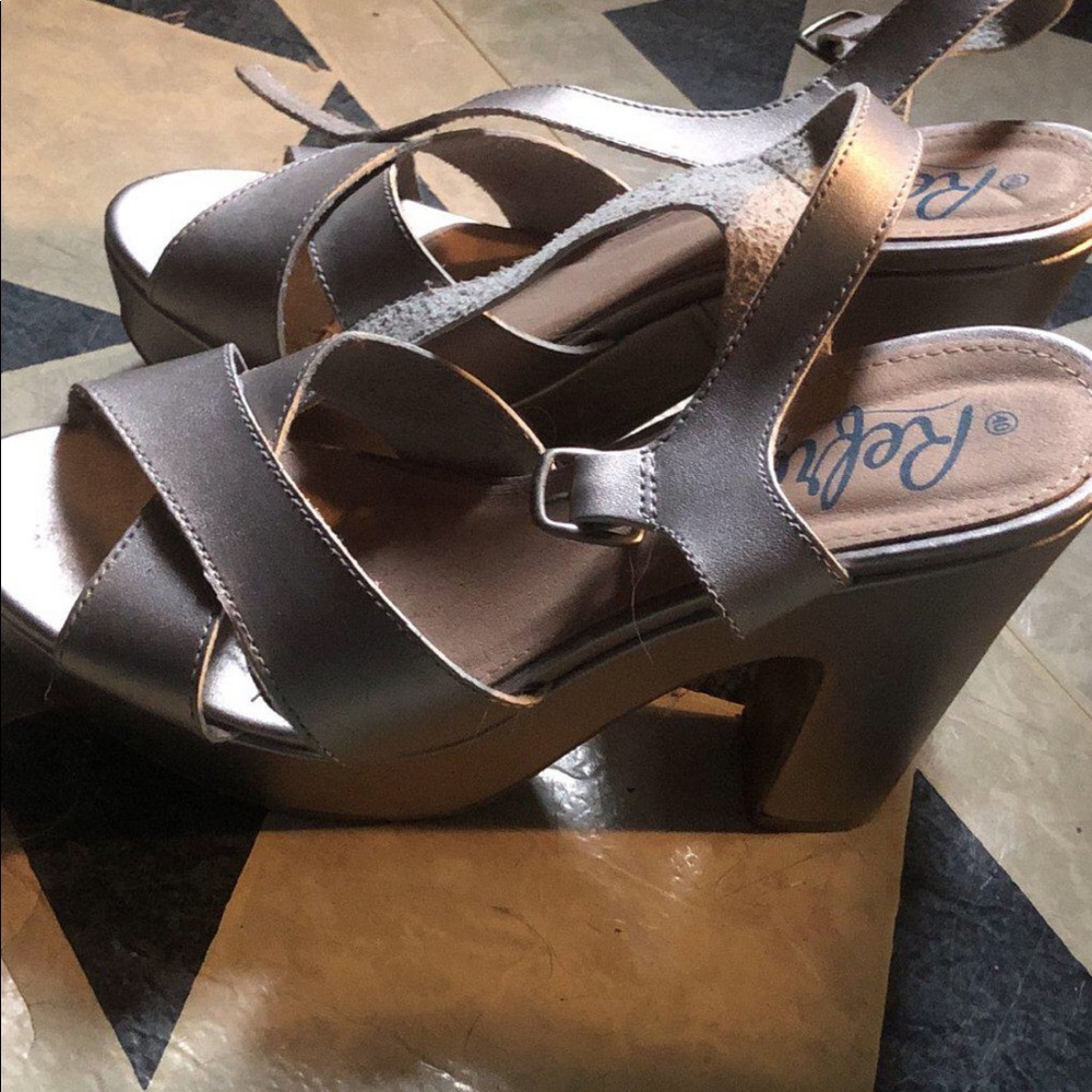 Silver high heel shoes